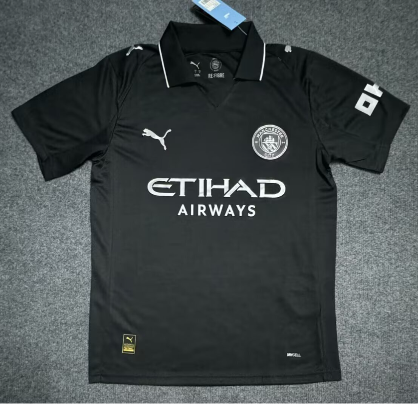 Black sports jersey with Puma and Etihad Airways logos on a gray surface